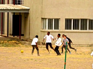 Playing soccer with my new friends!