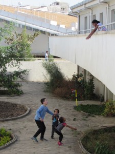 Playing in the courtyard of our apartment building