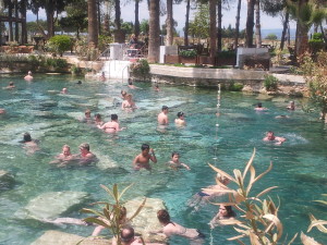 Swimming in the thermal pool among the ruins
